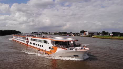 Aerial-View-Of-River-Cruise-Ship-MS-VistaStar-Moving-Along-River-Noord