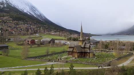 Aerial-View-On-Lom-Stave-Church-In-Lom-Municipality-In-Innlandet-County,-Norway---drone-shot