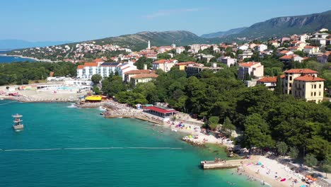 Aerial-View-Of-Crikvenica-Main-Town-Beach-In-Croatia---drone-shot
