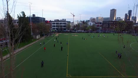 Aerial-of-athletes-playing-recreational-soccer-at-Cal-Anderson-Park-in-Seattle