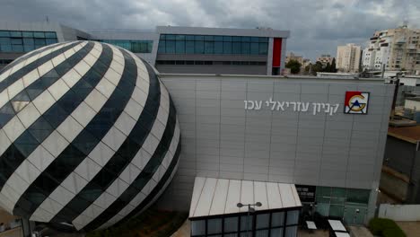 Modern-architecture-sphere-on-the-outside-of-a-building-in-Haifa-city,-Israel