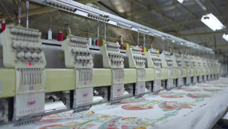 Colorful-sewing-cotton-processing-with-sewing-machine-automatically-in-fabric