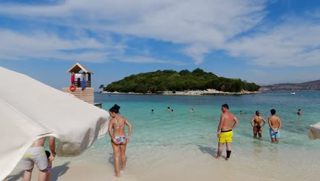 Many-tourists-at-Ksamil-Beach-in-Southern-Albania-during-summer