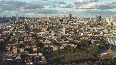 aerial-flight-towards-housing-projects-and-the-Brooklyn-Queens-Expressway-in-Brooklyn-New-York-City