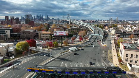 Aerial-of-cars-entering-Ben-Franklin-bridge-and-paying-toll-at-plaza