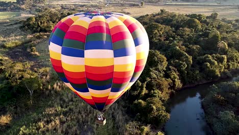Panorama-landscape-of-isolated-hot-air-balloon-at-countryside-scenery