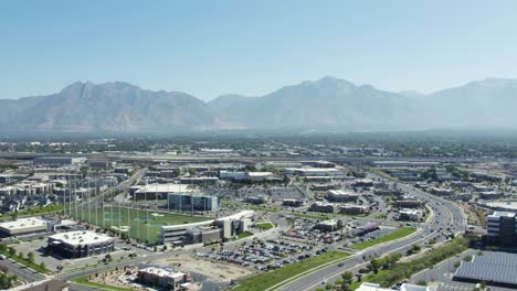 Modern-City-with-Mountain-Background-near-Salt-Lake-City,-Utah---Aerial