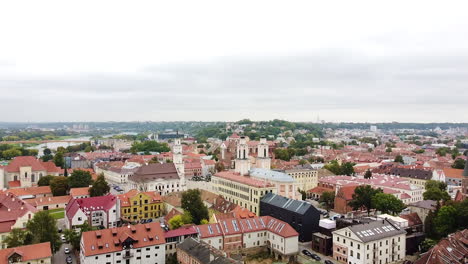 Majestic-rooftops-of-Kaunas-old-town,-aerial-flying-forward-view