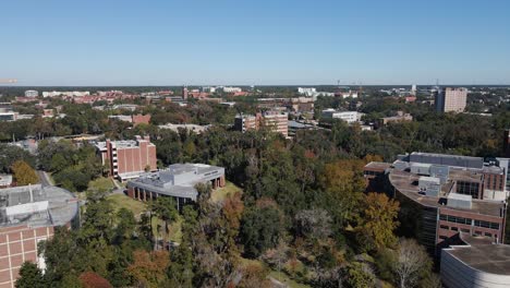 Aerial-drone-view-approaching-the-University-of-Florida,-in-sunny-Gainesville,-USA