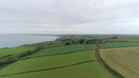 Aerial-tracking-over-coastal-farmland-in-the-perfect-English-countryside