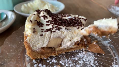 fork-taking-a-piece-of-banoffee-pie-away-to-eat