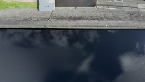 An-aerial,-wider-overhead-view-of-Loch-Cluanie-and-Cluanie-dam