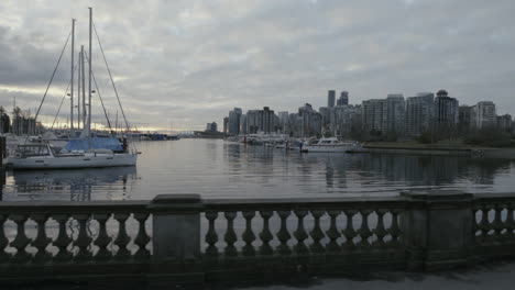 Wide-dynamic-shot-of-a-boats-in-morning-marina,-Vancouver-West-End,-Slowmotion