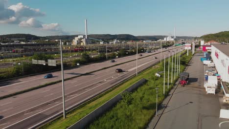 Aerial-view-showing-traffic-on-the-normally-heavy-trafficed-road-Alingsasleden-E20-leading-from-Gothenburg-to-Orebro-in-Sweden