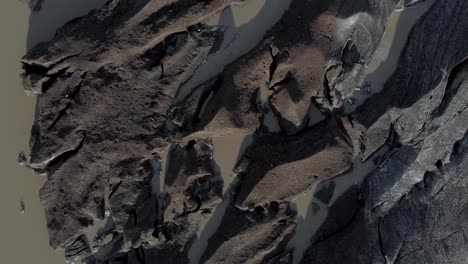 Aerial-Shot-Directly-Downwards-of-a-Melting-Glacier