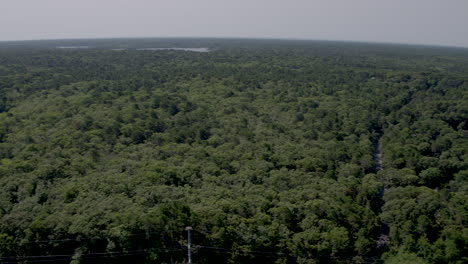 Aerial-pan-of-houses-trees-and-ponds-in-Cape-Cod-Massachusetts