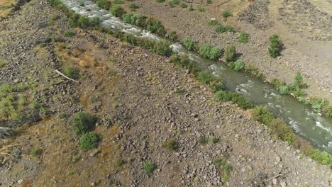 Aerial-footage-of-the-Jordan-river-flowing-in-northern-Israel