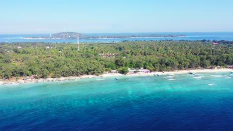 Idyllic-tropical-islands-for-holidays-in-Indonesia-with-hotels-and-resorts-inside-lush-vegetation,-white-sandy-beaches-and-shallow-turquoise-lagoon-for-swim-and-snorkel