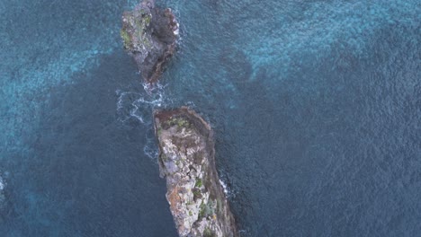 Aerial-view-over-rock-needle-in-Atlantic-Ocean,-Madeira-island
