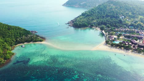 Koh-Phangan-Aerial---two-islands-connected-with-the-sandbar-in-the-turquoise-crystal-clear-seawater-with-rich-marine-life