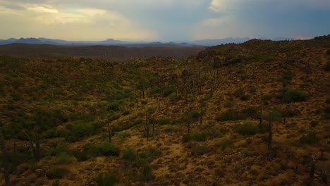 Aerial-drone-shot-of-the-Arizona-Desert,-Mountains,-and-Landscape-on-a-cloudy-day