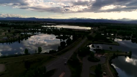 Be-humbled-in-awe-at-this-sunset-taken-by-drone-of-the-Rocky-Mountains-with-reflections-in-the-lakes-below