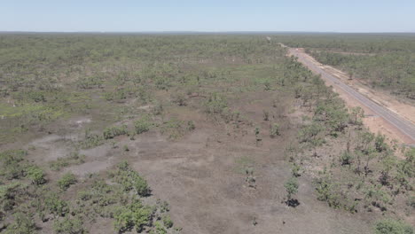 Aerial-drone-shot-of-highway-and-the-Australian-Outback,-Northern-Territory