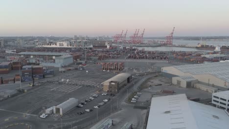 Aerial-lowering-view-across-Peel-Port-harbour-distribution-cargo-freight-shipyard