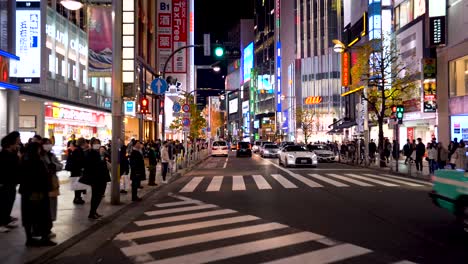 Nighttime-view-streets-of-Shinjuku-Tokyo-filmed-in-4k-moving-forwards-stabilized-by-gimbal,-Tokyo-travel-video-showing-an-interesting-view-of-bright-Japanese-billboards-on-buildings