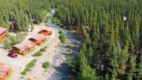 4K-Drone-Video-of-Cabins-along-Carlo-Creek-near-Denali-National-Park-and-Preserve,-AK-during-Summer