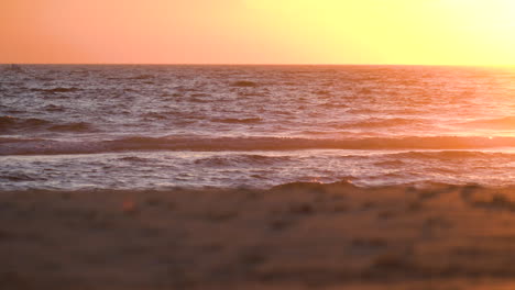 Empty-beach-during-sunset-in-Cadiz,-Spain