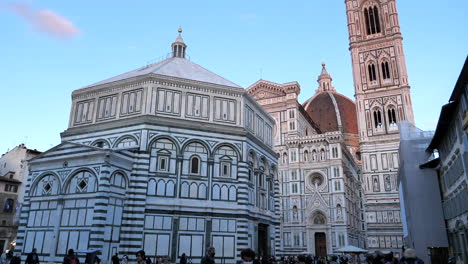 Tourists-Walking-In-Front-Of-Baptistery-Of-St