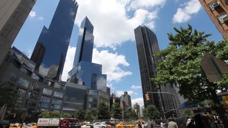 Busy-Manhattan-traffic-on-a-sunny-day-on-Columbus-Circle-in-New-York-City