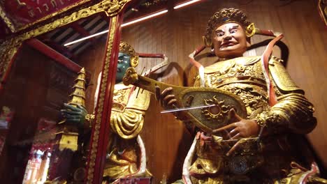 Footage-of-Vaisramana,-God-of-North-Or-God-Of-Wealth-and-Dhatarattha,-God-Of-East-Located-At-Wat-Mangkon-Kamalawat-,-Bangkok,-Thailand