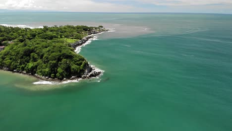 drone-shot-of-an-island-over-the-sea