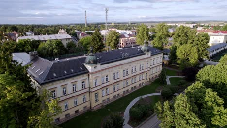 Drone-shot-of-local-school-Riegrova-in-Svitavy,-Czech-Republic