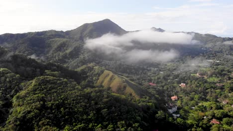 Clouds-over-Valle-de-Anton-town-in-central-Panama-located-in-extinct-volcano-crater,-Aerial-wide-angle-flyover-shot