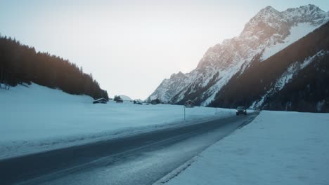 SUV-4x4-driving-on-outdoor-national-park-winter-landscape-road