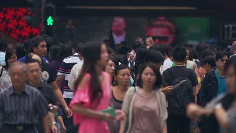 Slow-Motion-Of-Crowd-Of-People-Walking-In-Bustling-City-In-Hong-Kong