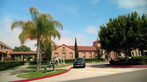 View-Of-Liberty-Station-In-San-Diego-The-Former-Naval-Training-Center-Barracks-With-Waving-American-Flag-In-California