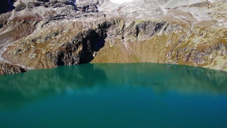 Reflections-Through-Glacial-Lake-Of-Weissee-Gletscherwelt-Reservoir-In-Austria
