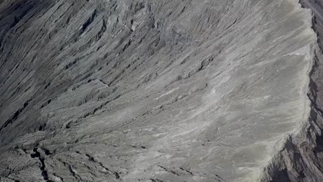 Baffling-fly-over-smoking-crater-of-Bromo-volcano-in-Java,-Indonesia---Aerial-wide-fly-over-360-panoramic-shot