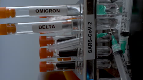 SARS-COV-2-Test-Tubes-Labelled-Alpha-Gamma-Delta-Beta-And-Omicron-Variants-Being-Removed-From-Rack