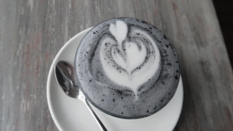 A-Cup-of-Hot-Black-Charcoal-Latte-Art