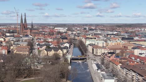 Aerial-shot-of-Uppsala-City-and-Cathedral-with-Fyris-River-in-Sweden
