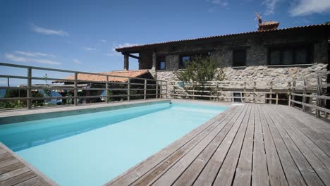 swimming-pool-in-a-rustic-vacational-house-in-summer