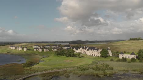 Shot-from-the-air-of-the-Idyllic-Lough-Erne-Resort-is-situated-on-Lough-Erne,-Enniskillen,-County-Fermanagh,-Northern-Ireland