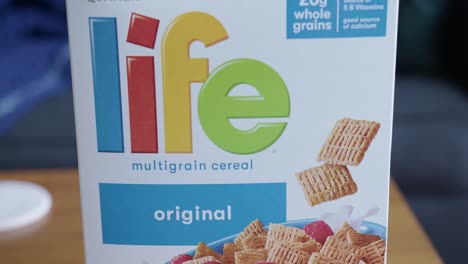 Close-Up-Tilt-Down-of-a-Box-of-Life-Cereal