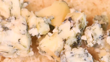 Macro-shot-of-blue-cheese-on-white-bread,-traditional-spanish-pincho