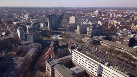Drone-flight-over-the-campus-of-the-Technical-University-of-Berlin-with-a-view-of-the-Tiergarten,-Bahnhof-Zoo,-Straße-des-17